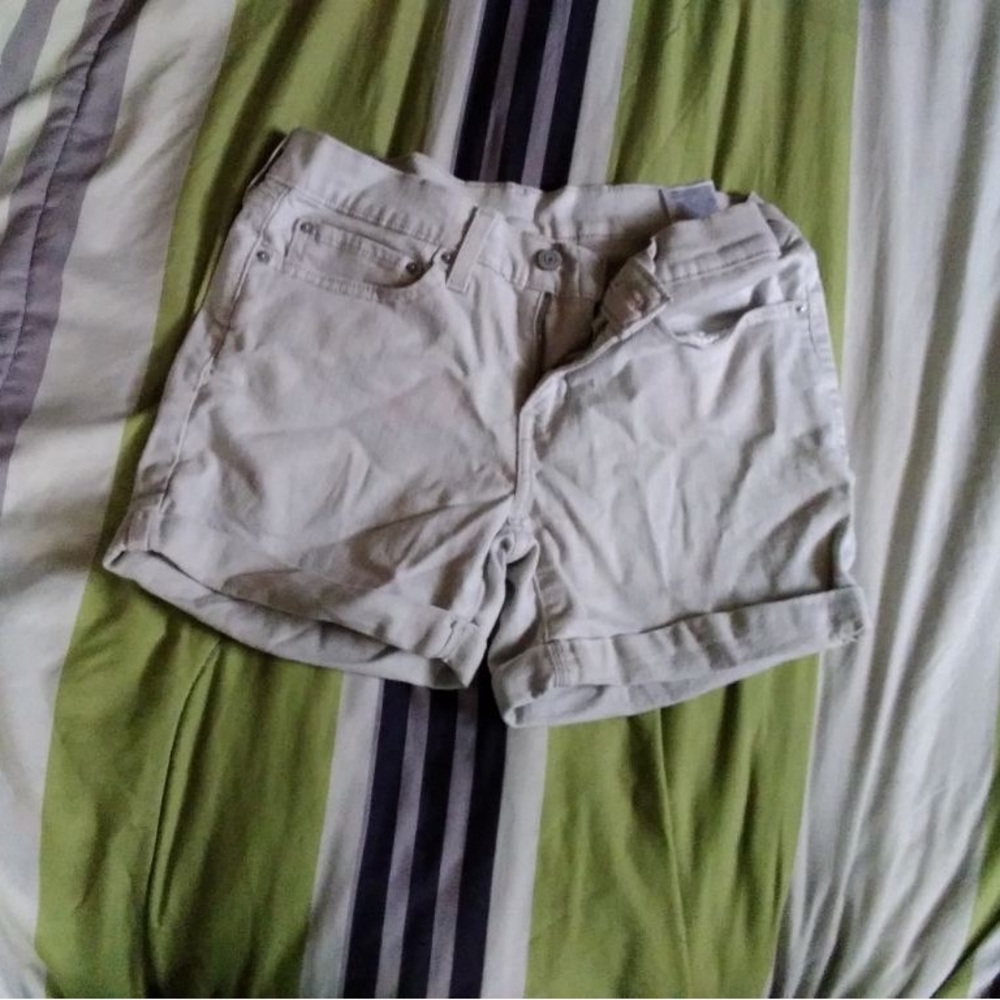 Tan shorts, 27